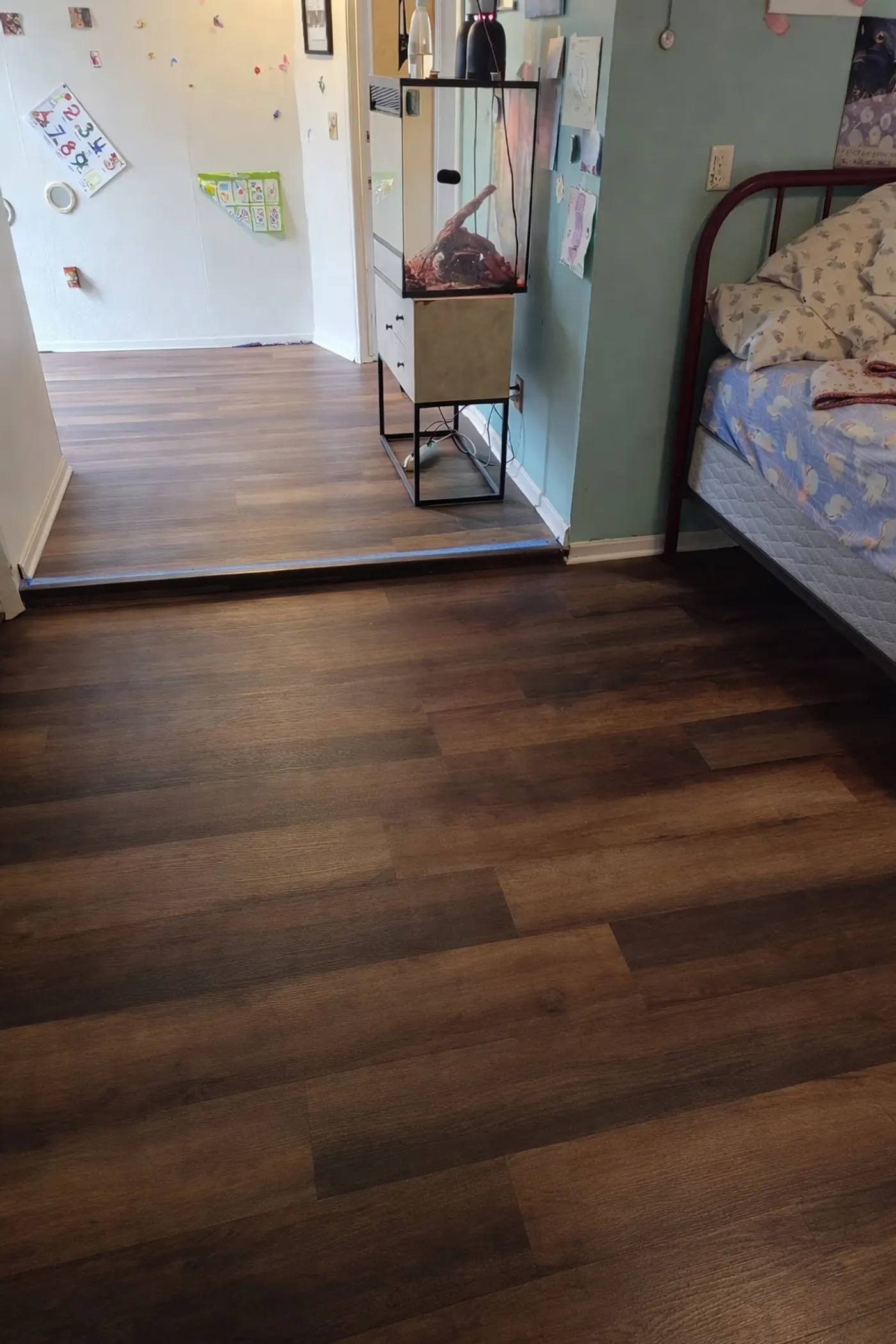 Luxury vinyl plank flooring in a bedroom